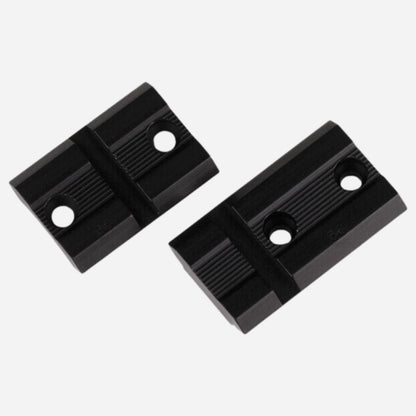 Two black plastic slides on a white background