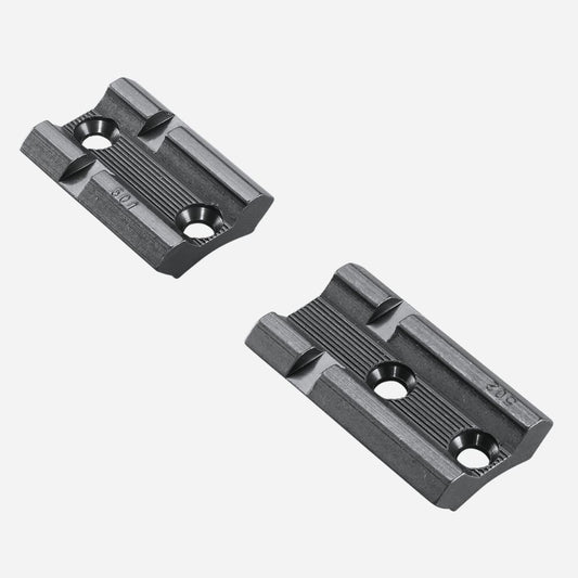 Two black metal brackets on a white background