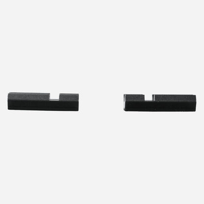 Two black metal sliders on a white background