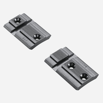 Two black metal brackets on a white background
