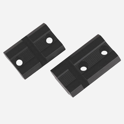 Two black plastic corner protectors on a white background