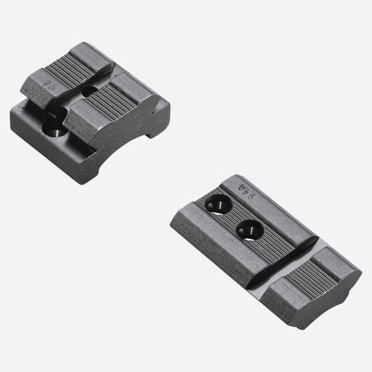 Two gray metal mounting brackets on a white background