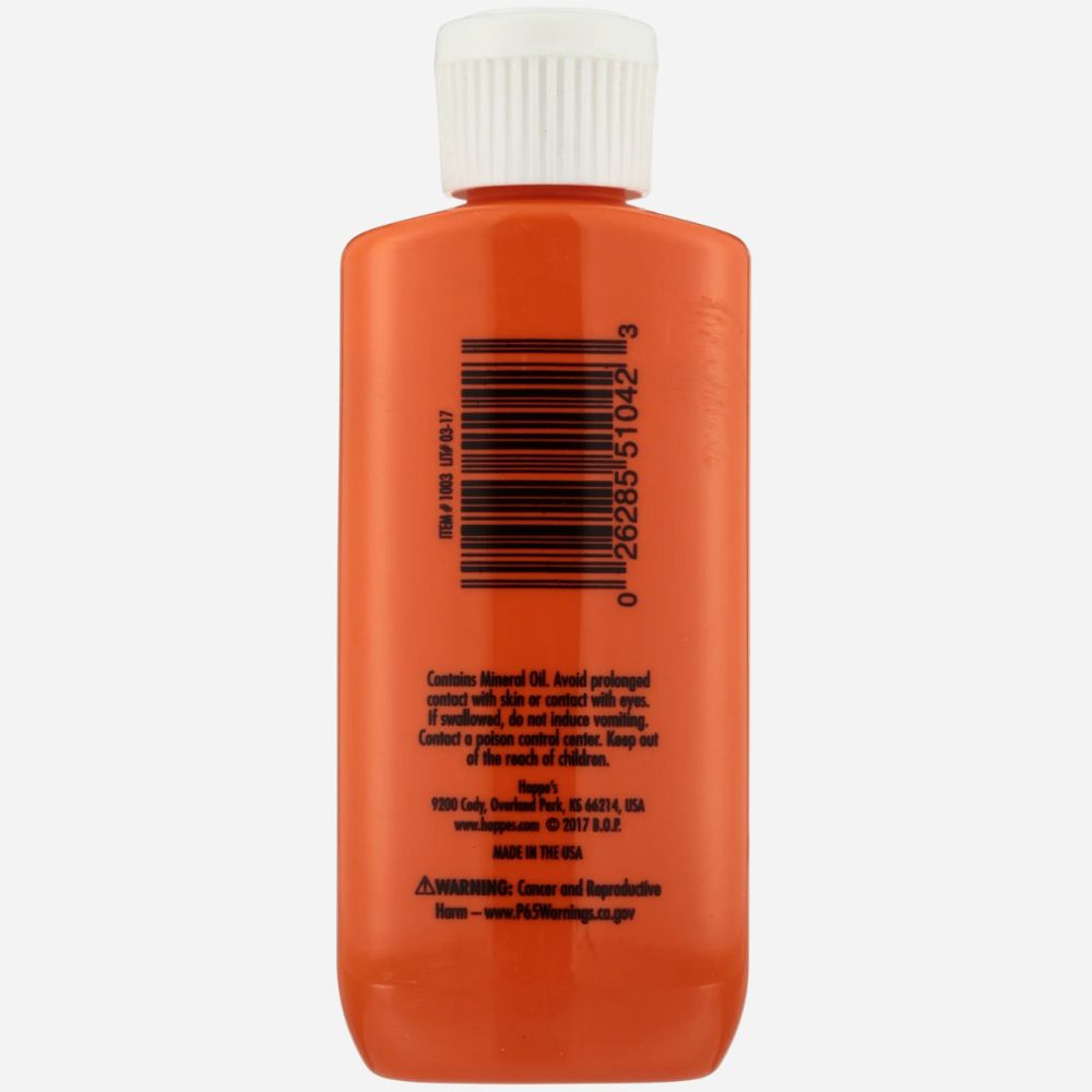 Orange bottle with a white cap on a white background