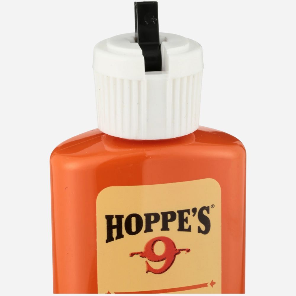Orange bottle with white cap labeled 'Hoppe's' on a white background