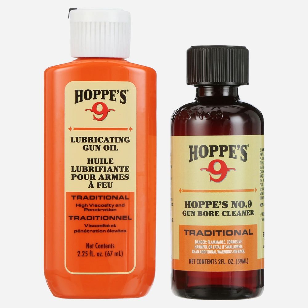 Two bottles of Hoppe's gun care products on a white background