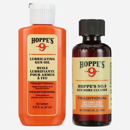 Two bottles of Hoppe's gun care products on a white background