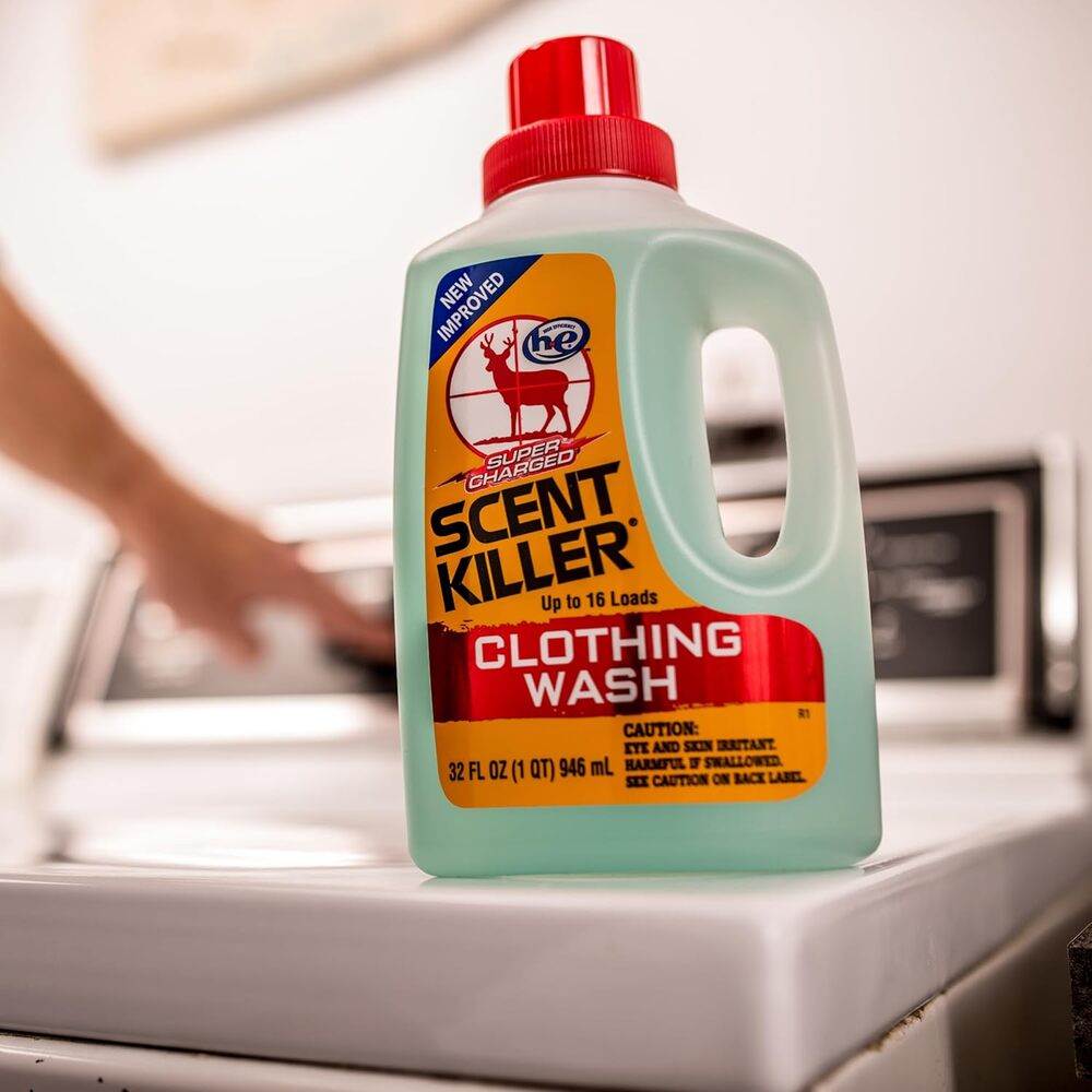 Bottle of Scent Killer Clothing Wash on a washing machine