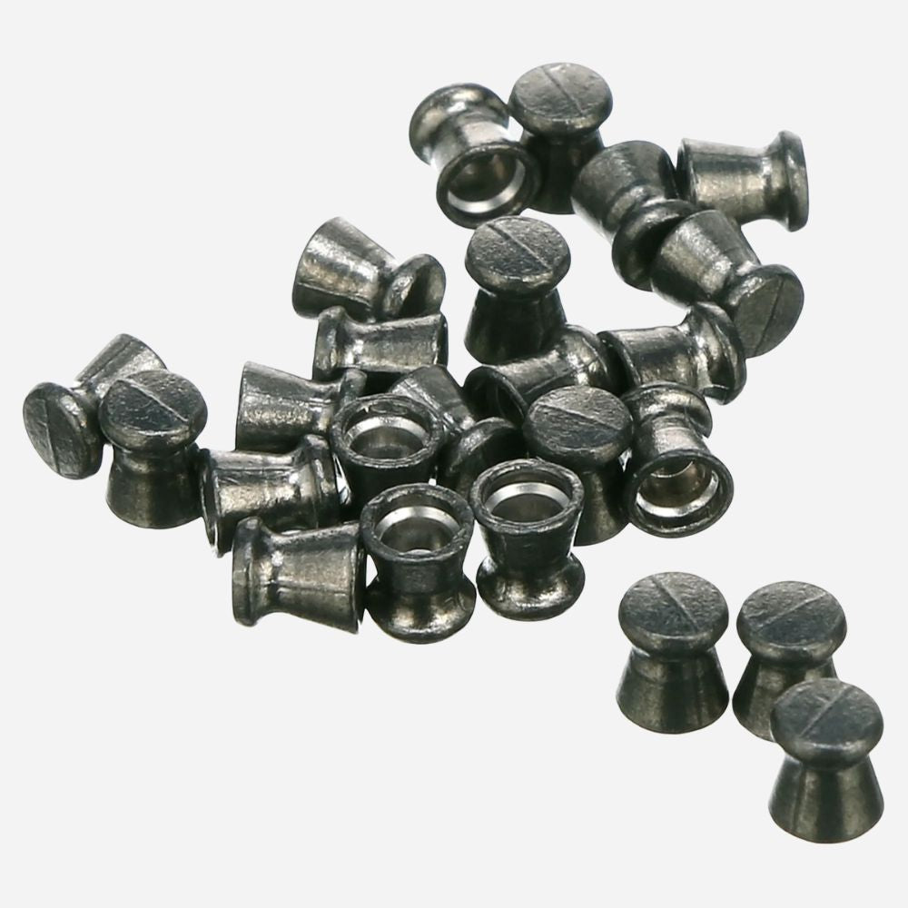 Collection of metal sinker weights on a white background