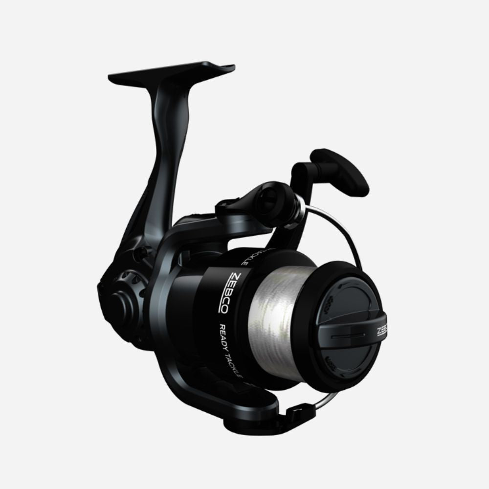 Black fishing reel on a white background