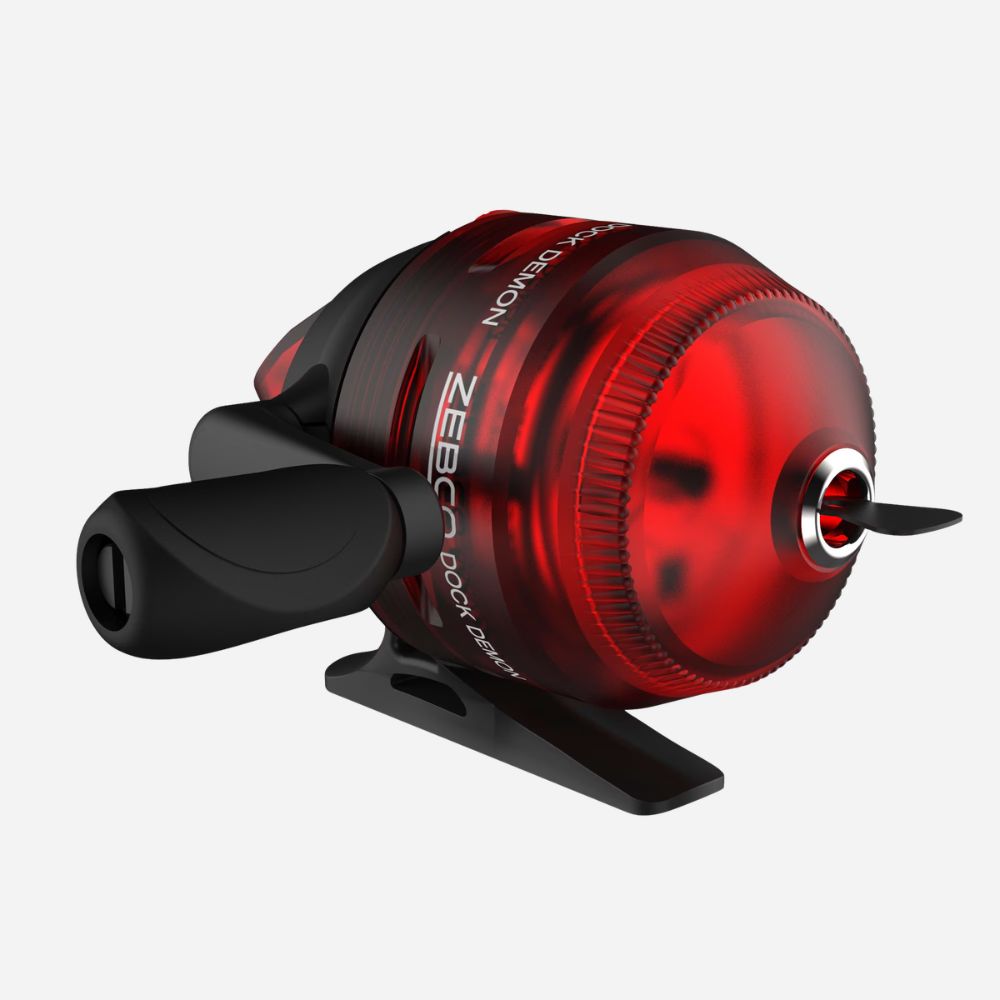 Red and black fishing reel on a white background