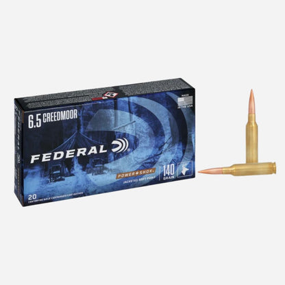 Federal ammunition box with two bullets on a white background