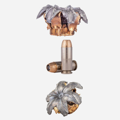 Decorative wall sconce with floral design on a white background