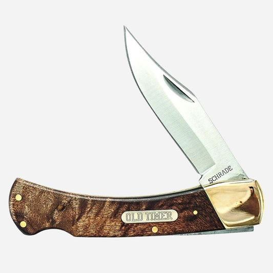 Schrade Old Timer folding knife with wooden handle on a white background