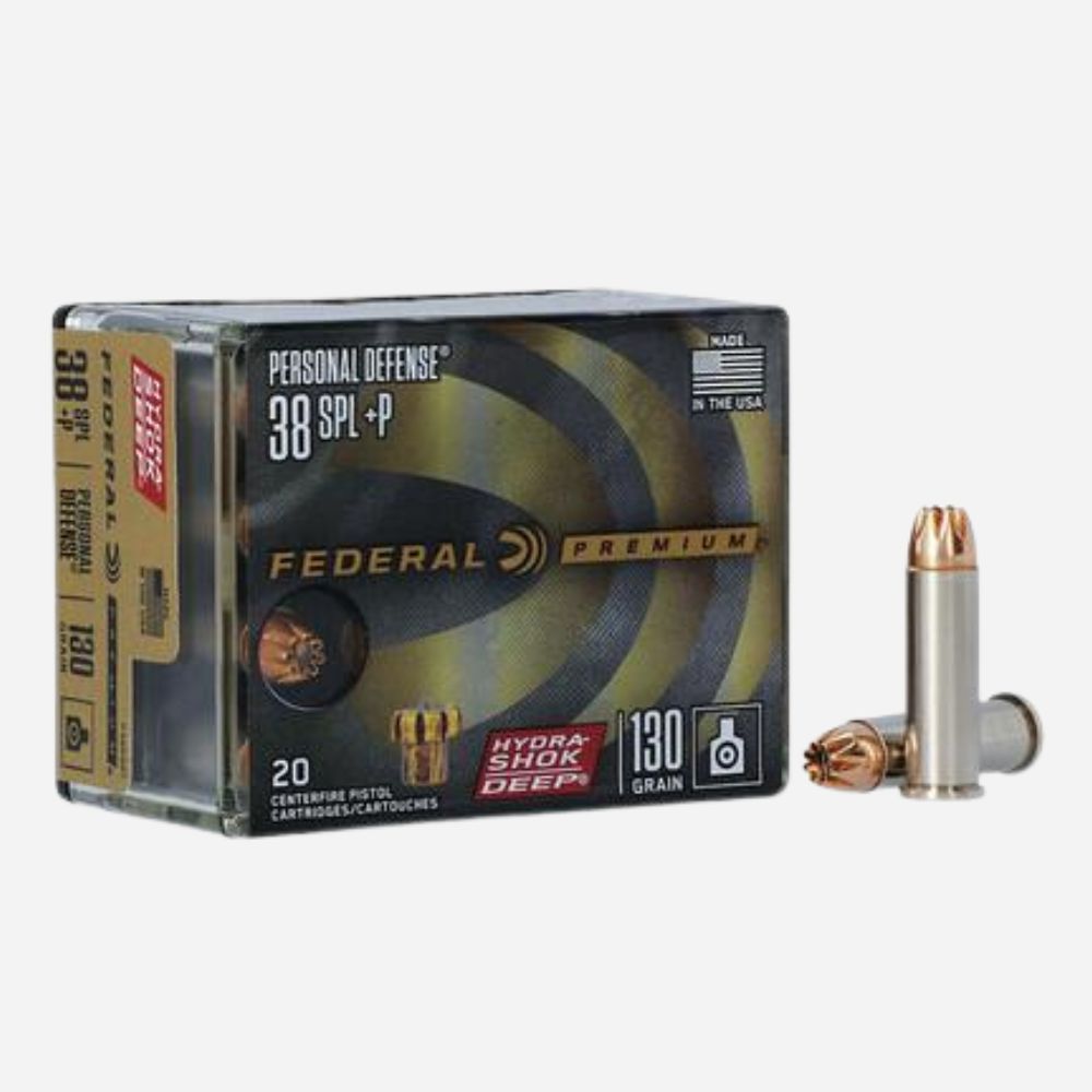 Federal Personal Defense ammunition box with bullets on a white background