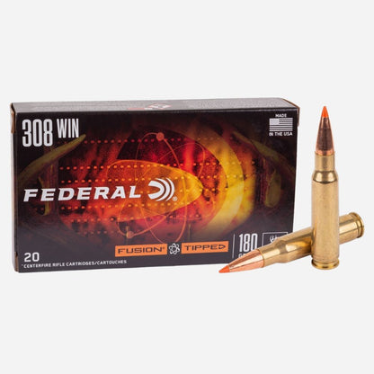 Federal 308 Win ammunition box with two bullets on a white background