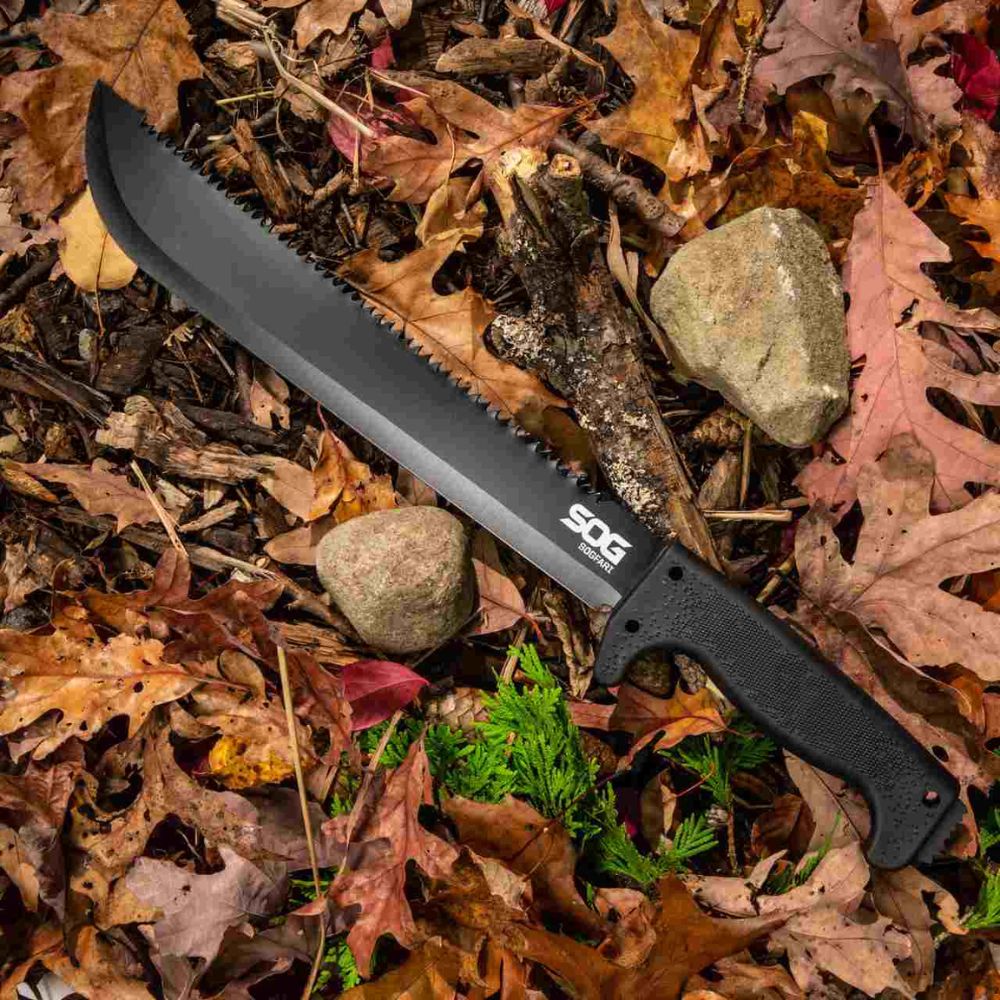 SOG knife on a bed of autumn leaves and rocks