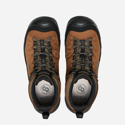 Pair of brown and black KEEN hiking boots on a white background