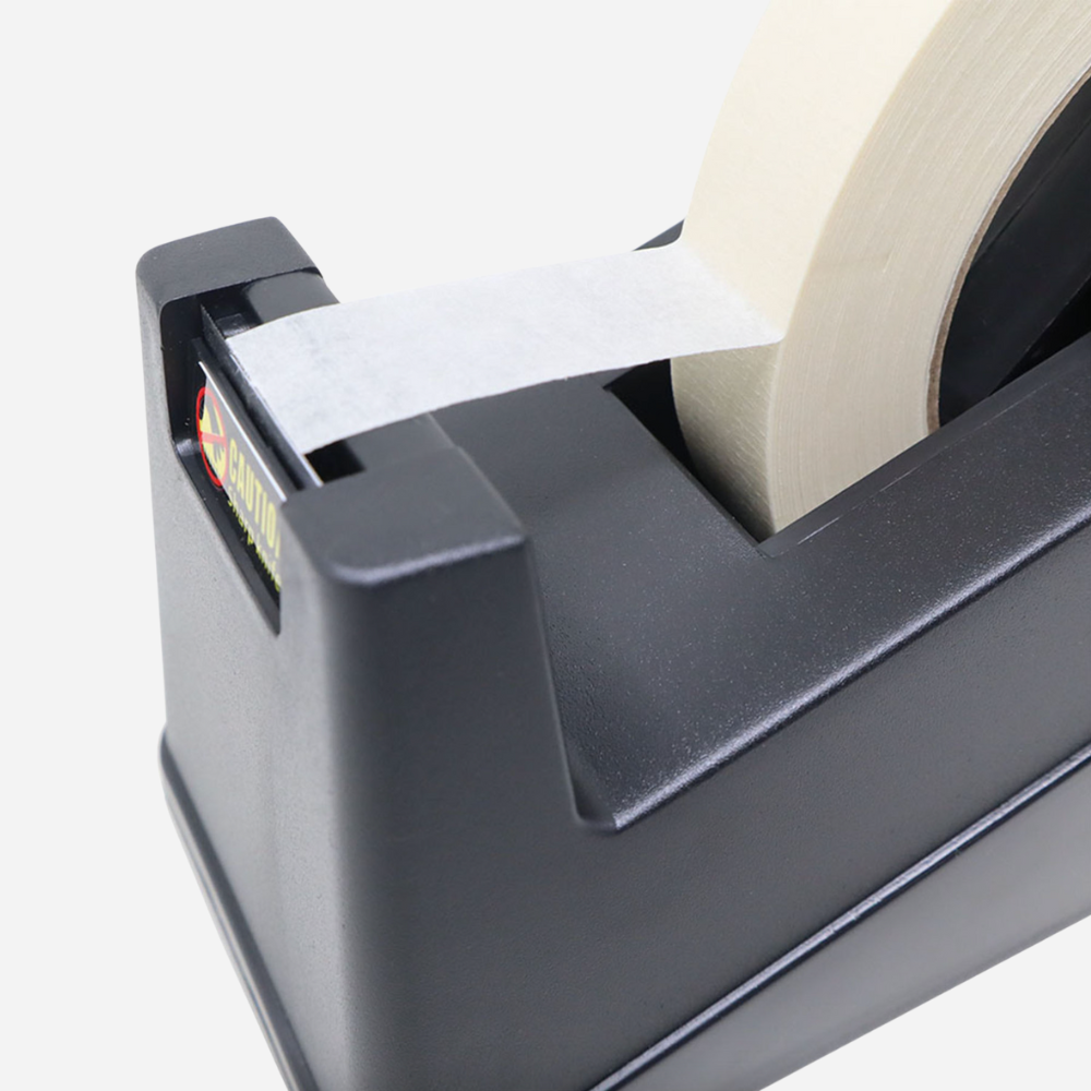 Tape dispenser with a roll of tape on a white background
