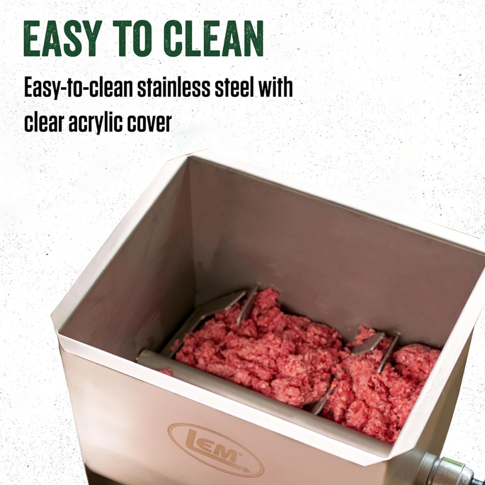 Stainless steel meat grinder with ground meat and clear acrylic cover, featuring the brand 'LEM'.
