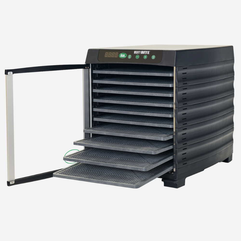 Black dehydrator with open door on a white background