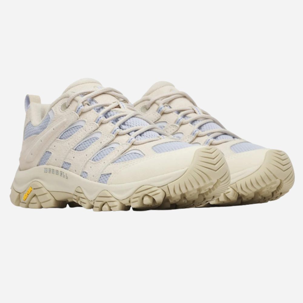 A pair of Merrell hiking shoes in off-white and light blue, shown from a side profile view against a light gray background.