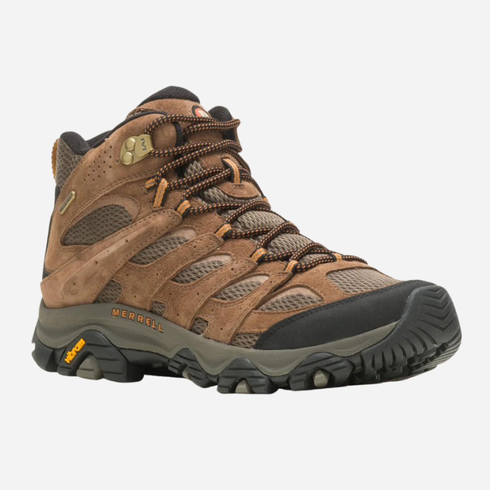 Brown hiking boot with black sole on a white background