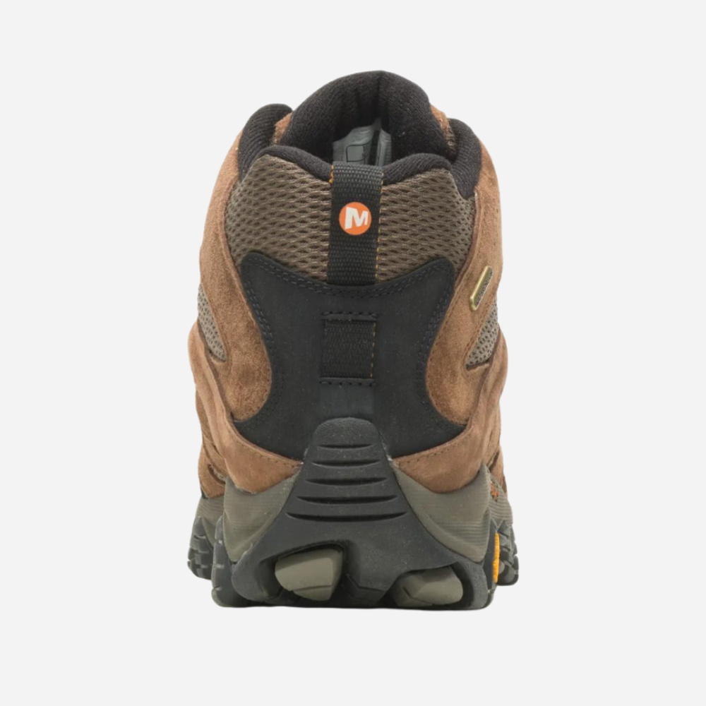 Brown hiking boot with brand logo on a white background