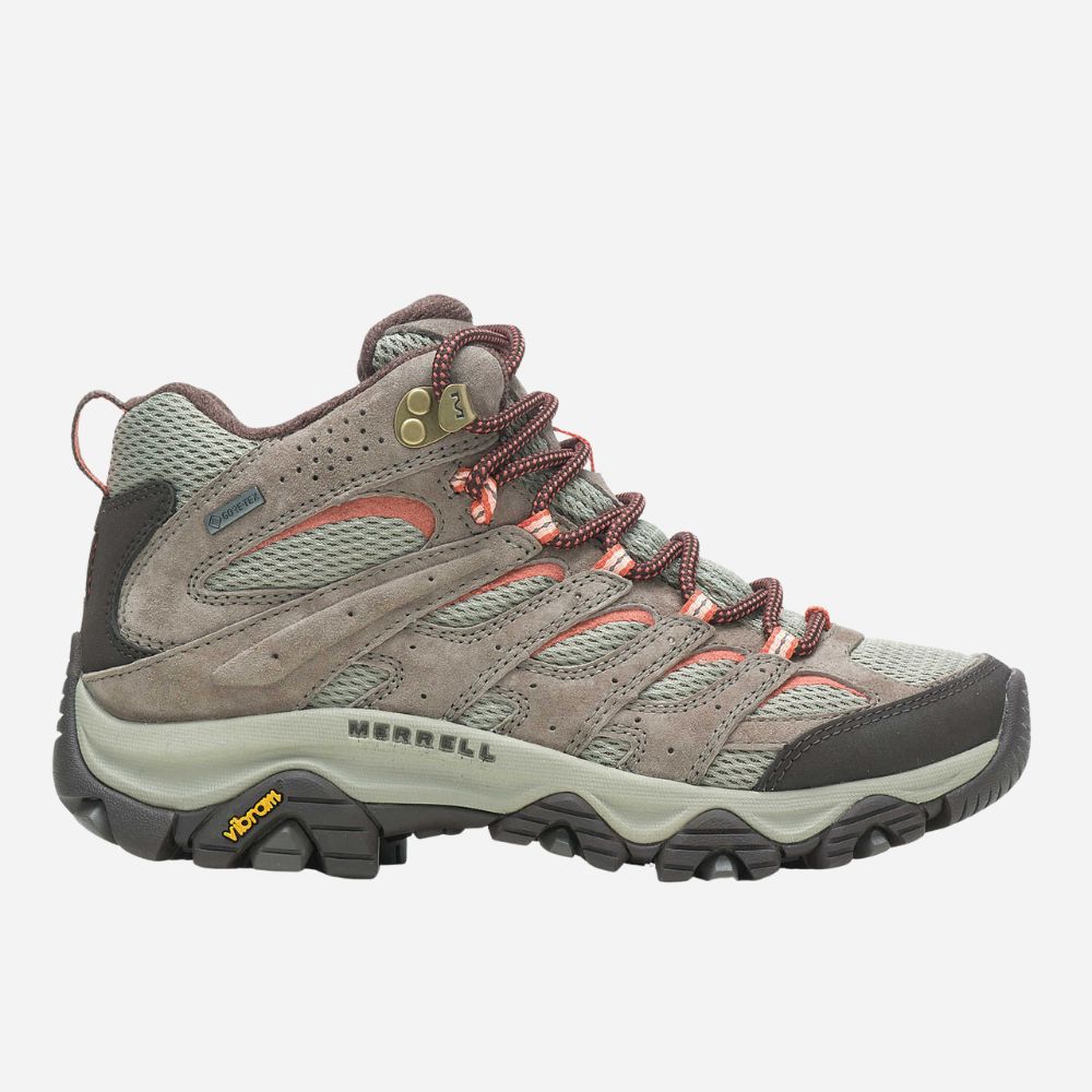 Gray hiking boot with red accents on a white background