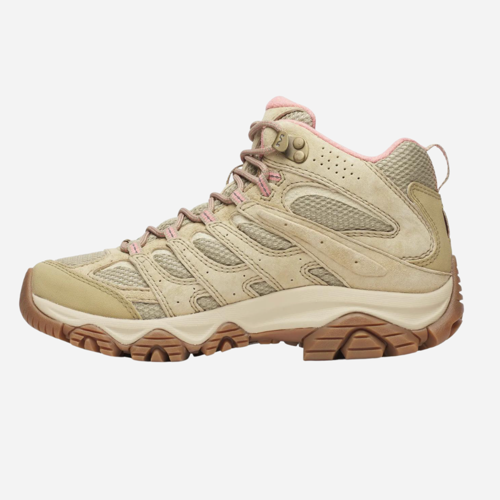 Beige hiking boot with pink accents on a white background