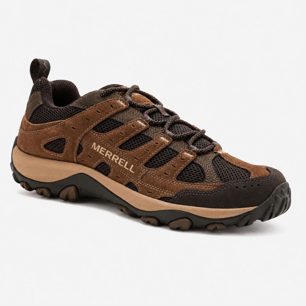 A Merrell hiking shoe in brown and black with a tan midsole, shown from a three-quarters angle on a light gray background.