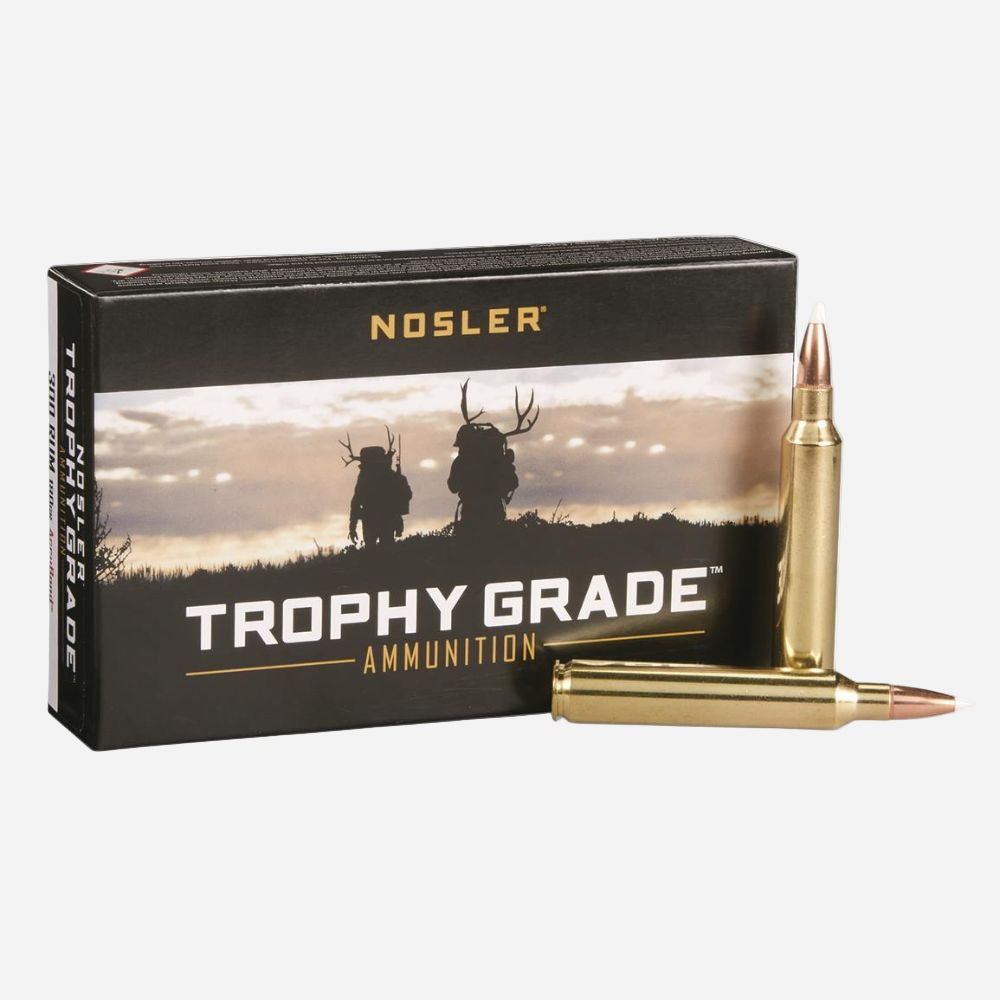 Nosler Trophy Grade ammunition box with a bullet on a white background