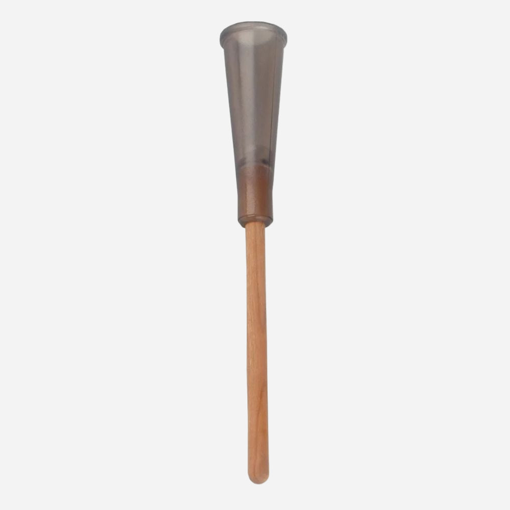 Transparent plastic cone with wooden handle on a white background