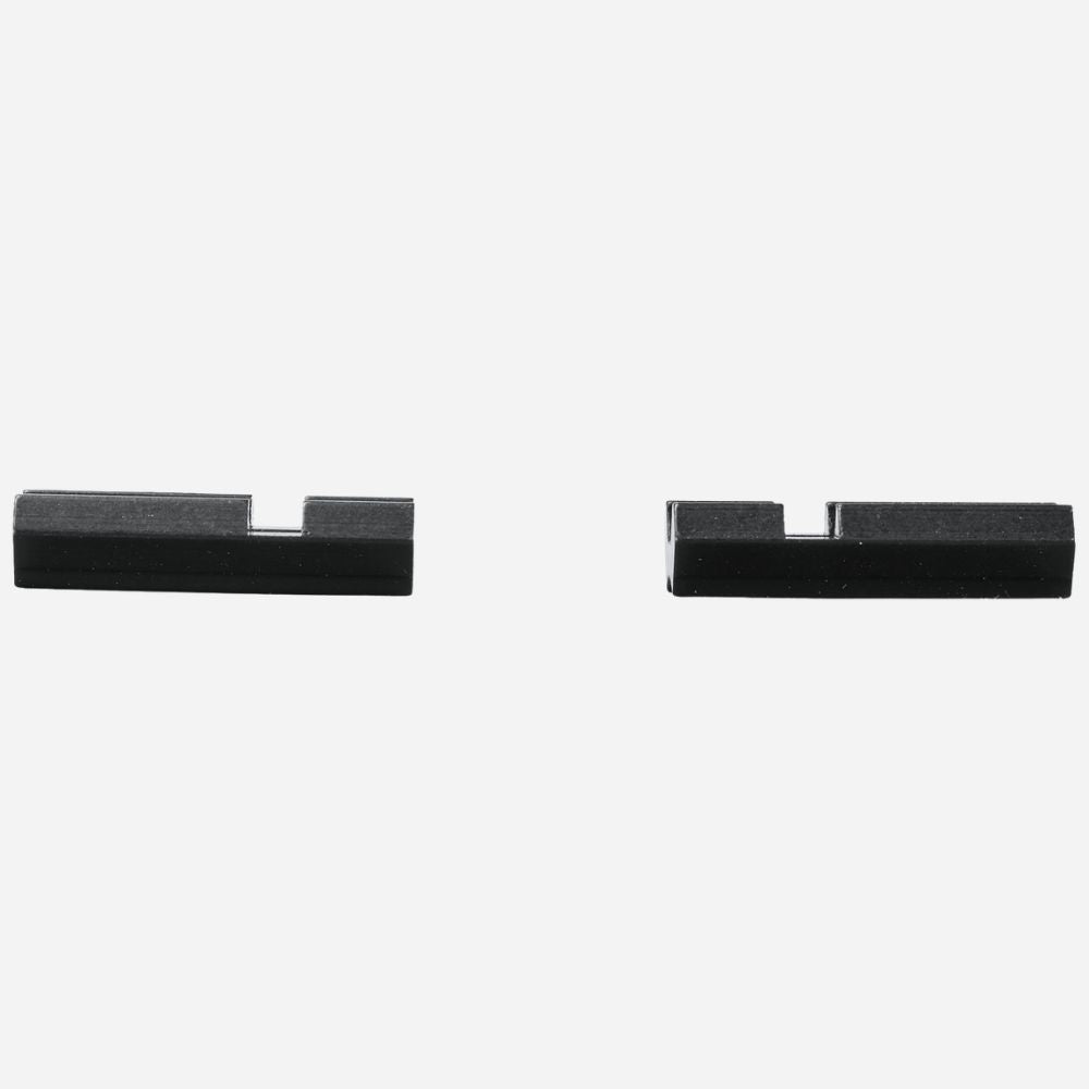 Two black metal brackets on a white background