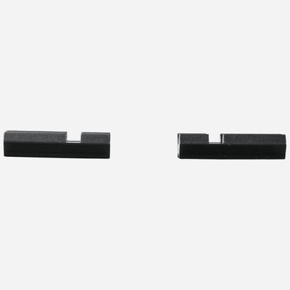Two black metal brackets on a white background