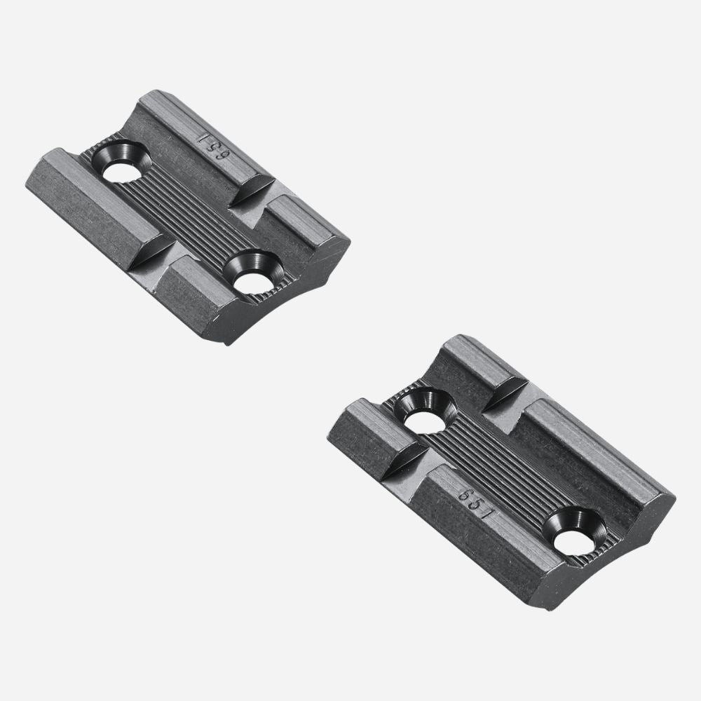 Two black metal brackets on a white background