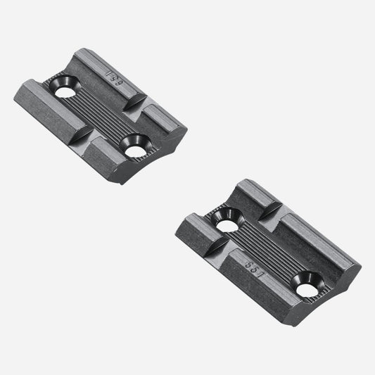 Two black metal brackets on a white background