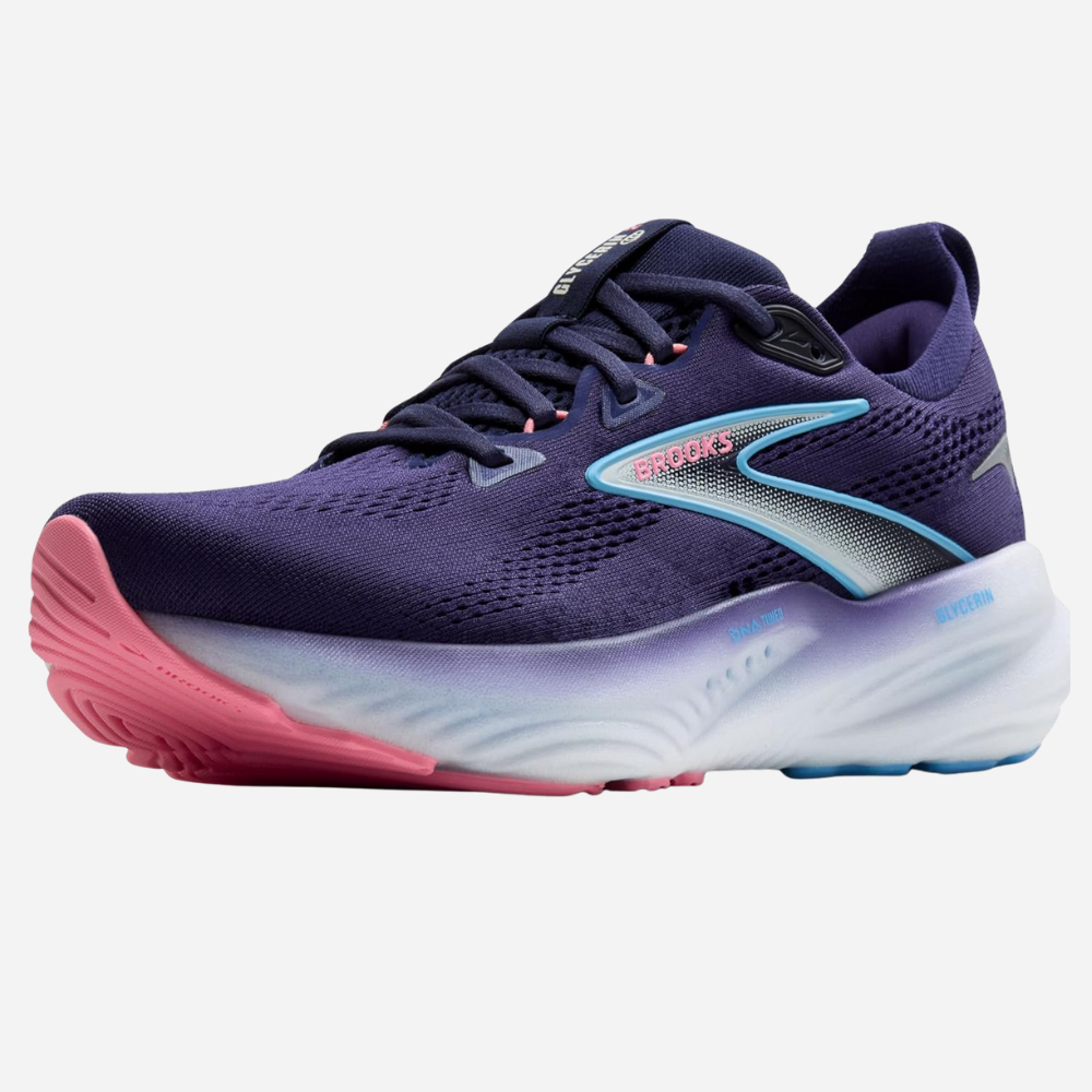 Navy running shoe with pink sole on a white background