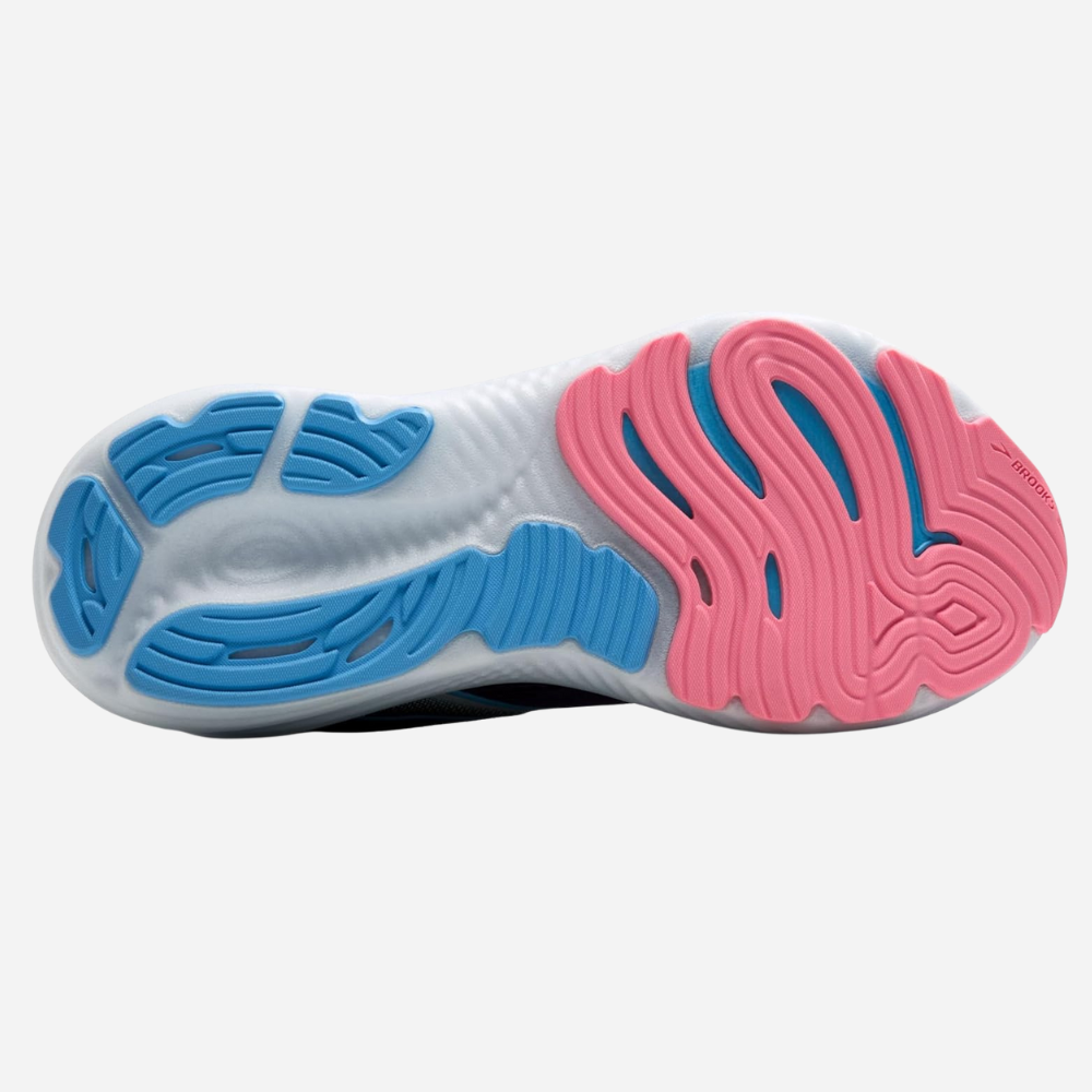 Close-up of a shoe sole with pink and blue patterns on a white background