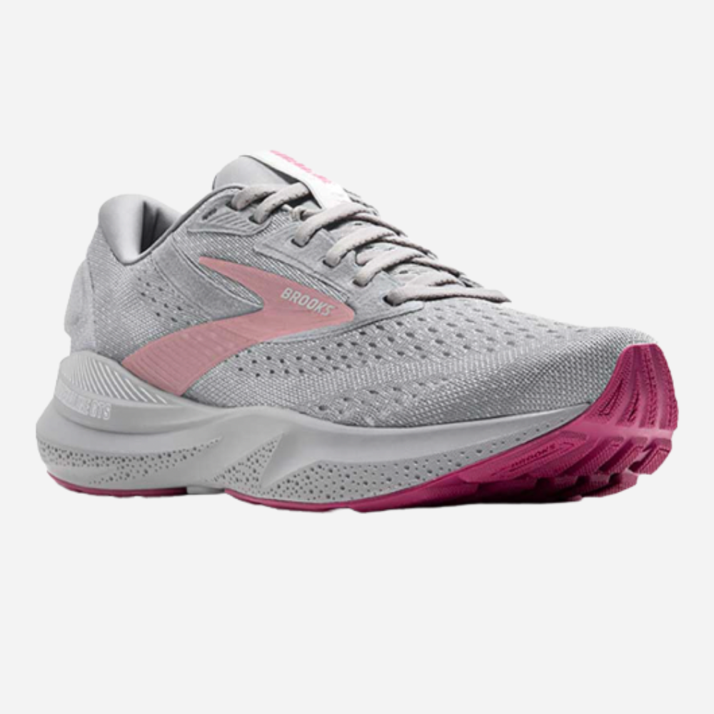 Gray and pink running shoe on a white background