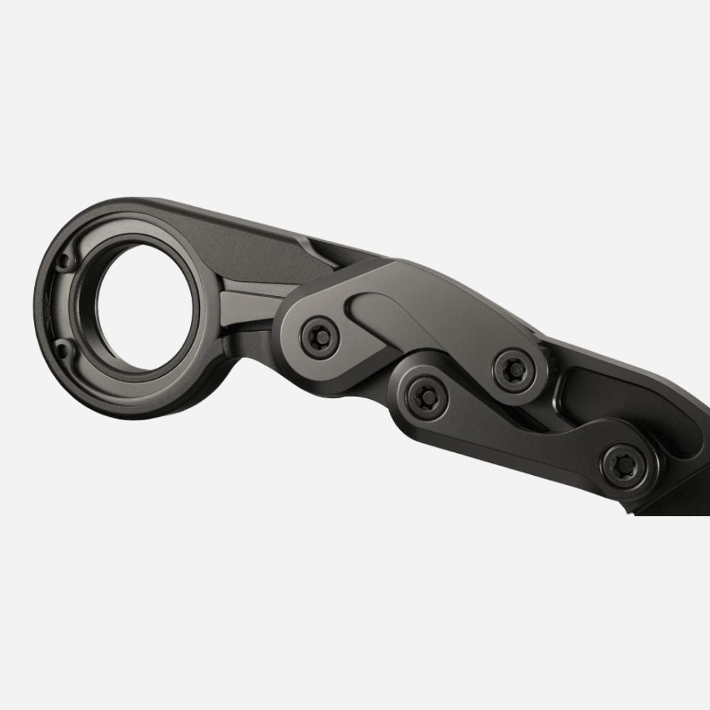 Black metal folding knife on a white background