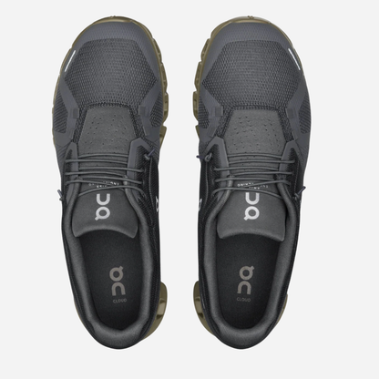 Pair of black athletic shoes with 'on' branding on a white background