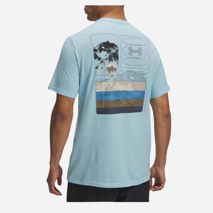 Light blue t-shirt with a graphic design on the back worn by a person