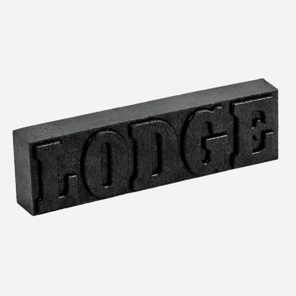 Black rectangular block with 'LODGE' text on a white background