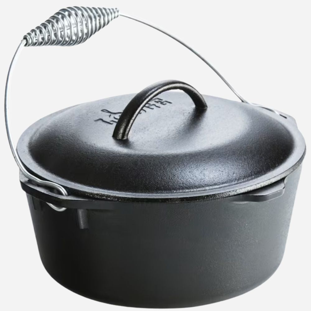 A black cast iron Dutch oven with a matching lid, featuring a long metal handle with a spring ring and side handles, on a light gray background.