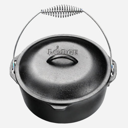 A black cast iron Dutch oven pot with a matching lid, featuring a silver metal wire handle and the embossed brand name 'LODGE' on the lid, set against a plain light gray background.